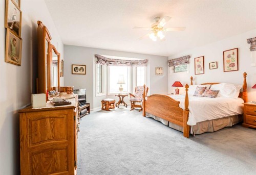 8 Prominence Path Sw, Calgary, AB - Indoor Photo Showing Bedroom