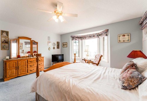 8 Prominence Path Sw, Calgary, AB - Indoor Photo Showing Bedroom