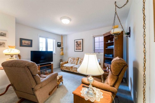 8 Prominence Path Sw, Calgary, AB - Indoor Photo Showing Living Room