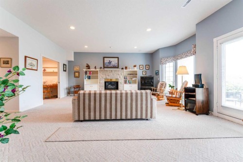 8 Prominence Path Sw, Calgary, AB - Indoor With Fireplace