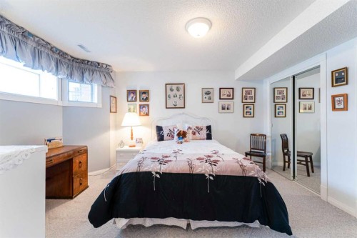8 Prominence Path Sw, Calgary, AB - Indoor Photo Showing Bedroom