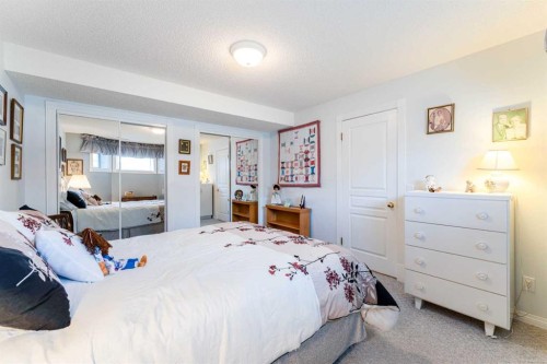 8 Prominence Path Sw, Calgary, AB - Indoor Photo Showing Bedroom