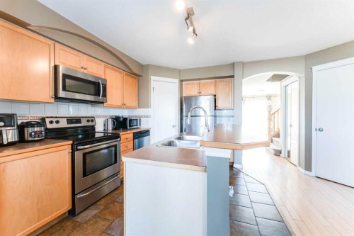 140 Prestwick Avenue Se, Calgary, AB - Indoor Photo Showing Kitchen With Stainless Steel Kitchen