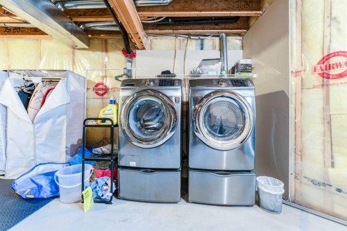 140 Prestwick Avenue Se, Calgary, AB - Indoor Photo Showing Laundry Room