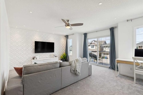 73 Auburn Springs Place Se, Calgary, AB - Indoor Photo Showing Living Room
