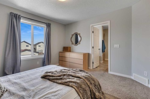 190 Covecreek Place Ne, Calgary, AB - Indoor Photo Showing Bedroom