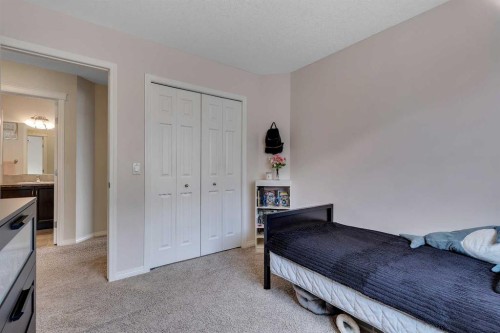 190 Covecreek Place Ne, Calgary, AB - Indoor Photo Showing Bedroom