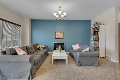 190 Covecreek Place Ne, Calgary, AB - Indoor Photo Showing Living Room