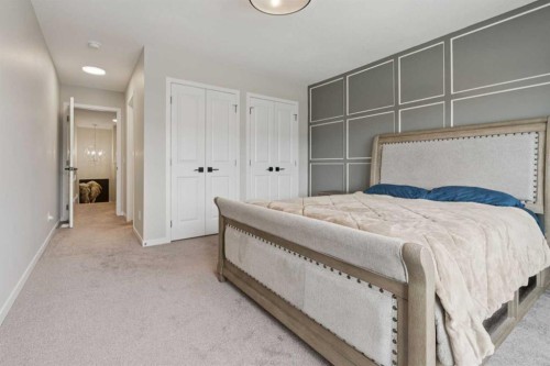 79 Magnolia Heath Se, Calgary, AB - Indoor Photo Showing Bedroom