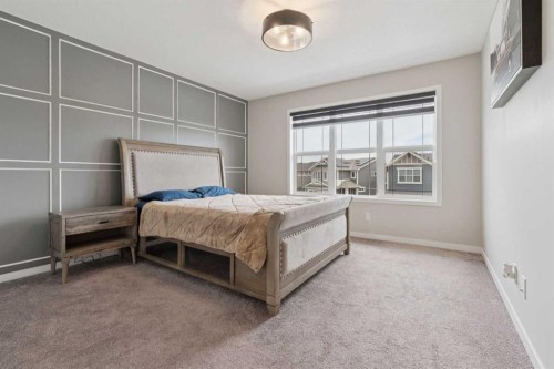 79 Magnolia Heath Se, Calgary, AB - Indoor Photo Showing Bedroom