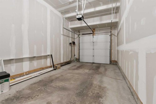 79 Magnolia Heath Se, Calgary, AB - Indoor Photo Showing Garage