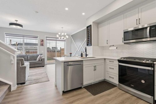 79 Magnolia Heath Se, Calgary, AB - Indoor Photo Showing Kitchen With Stainless Steel Kitchen With Upgraded Kitchen