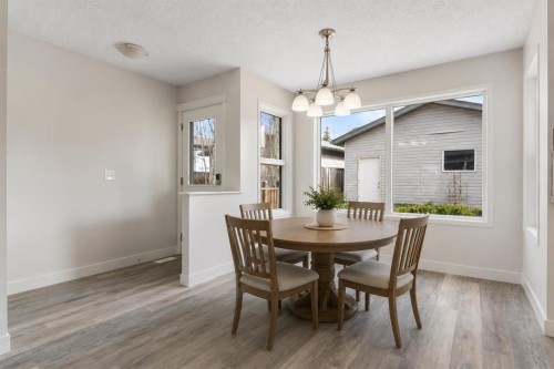 202 Sunset Heights, Cochrane, AB - Indoor Photo Showing Dining Room