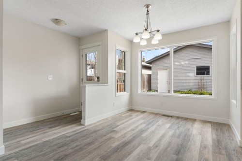 202 Sunset Heights, Cochrane, AB - Indoor Photo Showing Other Room