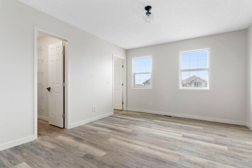 202 Sunset Heights, Cochrane, AB - Indoor Photo Showing Other Room
