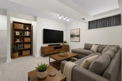 202 Sunset Heights, Cochrane, AB - Indoor Photo Showing Living Room
