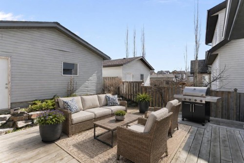 202 Sunset Heights, Cochrane, AB - Outdoor With Deck Patio Veranda With Exterior