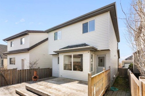 202 Sunset Heights, Cochrane, AB - Outdoor With Deck Patio Veranda With Exterior