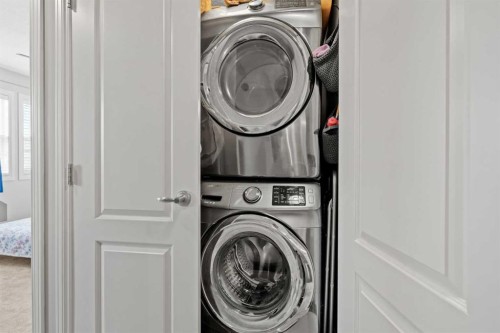 100 Redstone Avenue Ne, Calgary, AB - Indoor Photo Showing Laundry Room