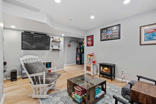 100 Redstone Avenue Ne, Calgary, AB - Indoor With Fireplace