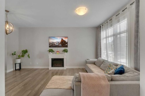 136 Sage Meadows Gardens Nw, Calgary, AB - Indoor Photo Showing Living Room With Fireplace