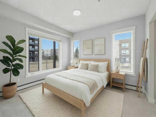 110-660 Shawnee Square Sw, Calgary, AB - Indoor Photo Showing Bedroom