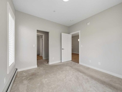 110-660 Shawnee Square Sw, Calgary, AB - Indoor Photo Showing Other Room