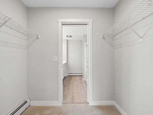 110-660 Shawnee Square Sw, Calgary, AB - Indoor With Storage