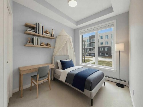110-660 Shawnee Square Sw, Calgary, AB - Indoor Photo Showing Bedroom