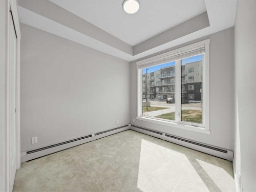 110-660 Shawnee Square Sw, Calgary, AB - Indoor Photo Showing Other Room