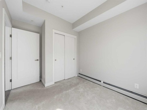110-660 Shawnee Square Sw, Calgary, AB - Indoor Photo Showing Other Room