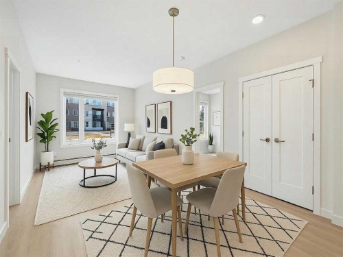110-660 Shawnee Square Sw, Calgary, AB - Indoor Photo Showing Dining Room