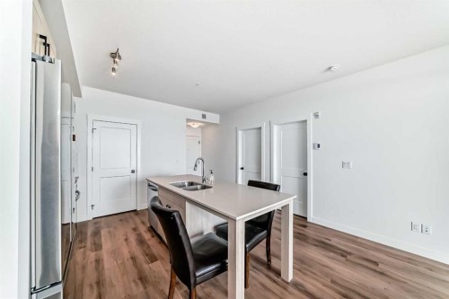 410-30 Sage Hill Walk Nw, Calgary, AB - Indoor Photo Showing Kitchen With Double Sink