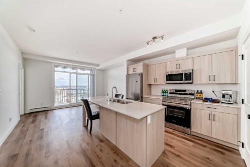 410-30 Sage Hill Walk Nw, Calgary, AB - Indoor Photo Showing Kitchen With Stainless Steel Kitchen With Double Sink