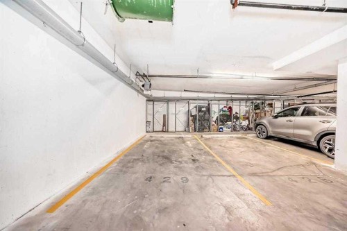 410-30 Sage Hill Walk Nw, Calgary, AB - Indoor Photo Showing Garage