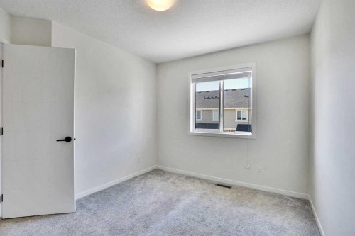 229 South Point Park Sw, Airdrie, AB - Indoor Photo Showing Other Room