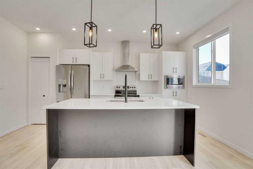 229 South Point Park Sw, Airdrie, AB - Indoor Photo Showing Kitchen With Stainless Steel Kitchen With Upgraded Kitchen