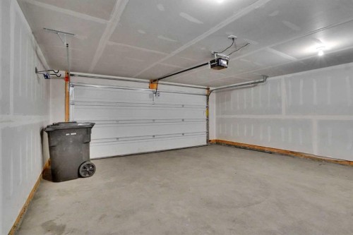 229 South Point Park Sw, Airdrie, AB - Indoor Photo Showing Garage