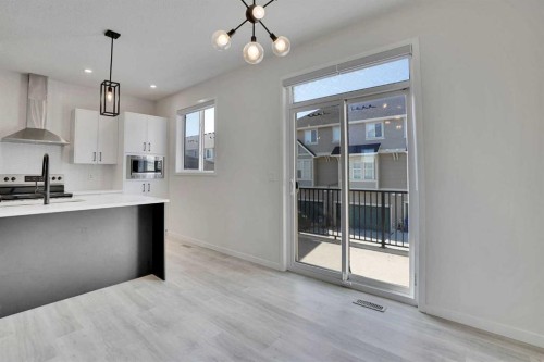 229 South Point Park Sw, Airdrie, AB - Indoor Photo Showing Kitchen With Upgraded Kitchen