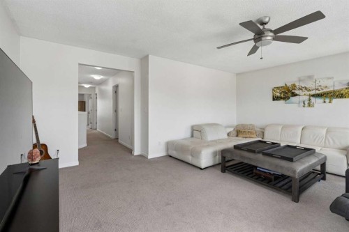 2134 Brightoncrest Common Se, Calgary, AB - Indoor Photo Showing Living Room