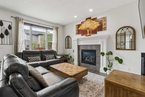 2134 Brightoncrest Common Se, Calgary, AB - Indoor Photo Showing Living Room With Fireplace