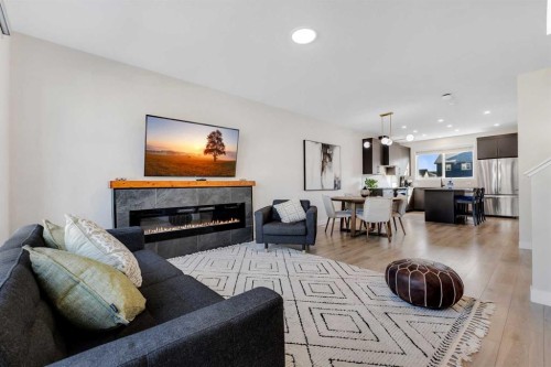 231 Lavender Manor Se, Calgary, AB - Indoor Photo Showing Living Room With Fireplace