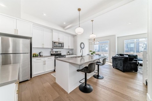35 Waterford Manor, Chestermere, AB - Indoor Photo Showing Kitchen With Upgraded Kitchen