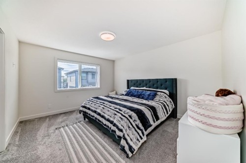 35 Waterford Manor, Chestermere, AB - Indoor Photo Showing Bedroom