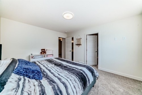 35 Waterford Manor, Chestermere, AB - Indoor Photo Showing Bedroom