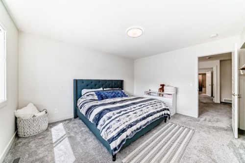 35 Waterford Manor, Chestermere, AB - Indoor Photo Showing Bedroom