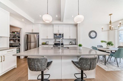 35 Waterford Manor, Chestermere, AB - Indoor Photo Showing Kitchen With Double Sink With Upgraded Kitchen