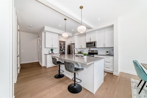 35 Waterford Manor, Chestermere, AB - Indoor Photo Showing Kitchen With Upgraded Kitchen