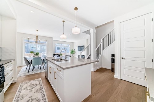 35 Waterford Manor, Chestermere, AB - Indoor Photo Showing Kitchen With Double Sink With Upgraded Kitchen