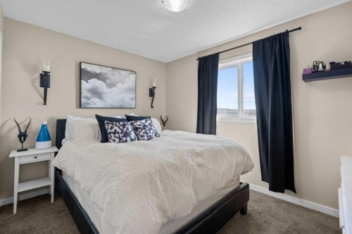 534 River Heights Crescent, Cochrane, AB - Indoor Photo Showing Bedroom